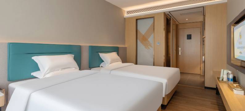 潮曼酒店(化州平定店)图片