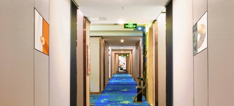 万华逸居酒店(于都站店)图片