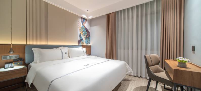 湛江吴川•KAWEIDAHOTEL卡威达酒店(吴川金沙广场第三中学店)图片