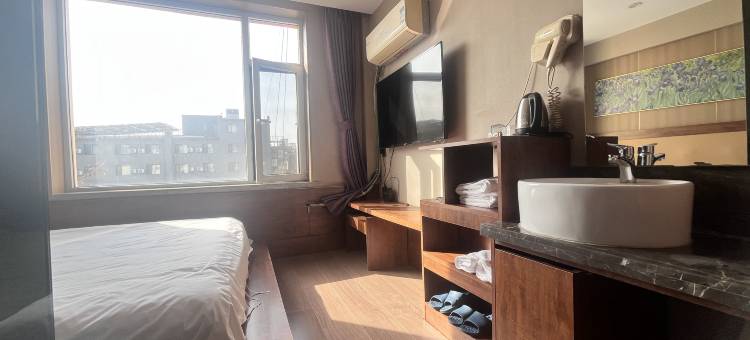 古塔区菩雅酒店(锦州火车站店)图片
