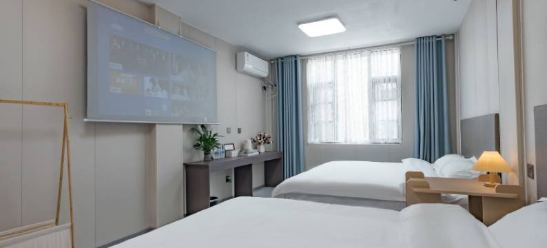 青柚民宿(开封万岁山武侠城清明上门园店)图片