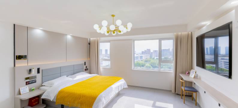 合悦观海影音酒店(烟台大学国际博览中心店)图片