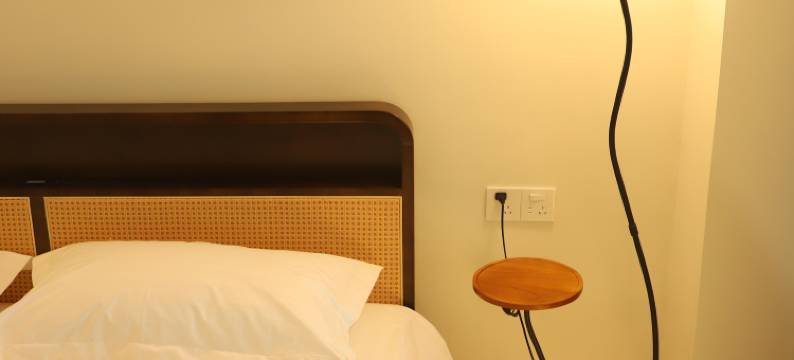 自然醒酒店(万达广场牡丹广场地铁站店)图片