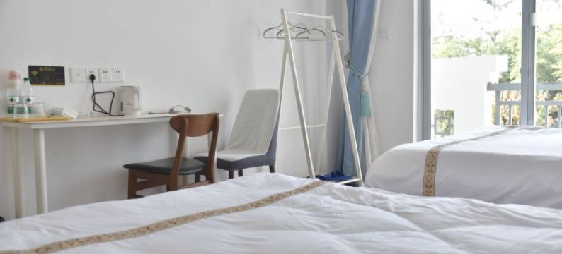 九鲤羽客酒店图片