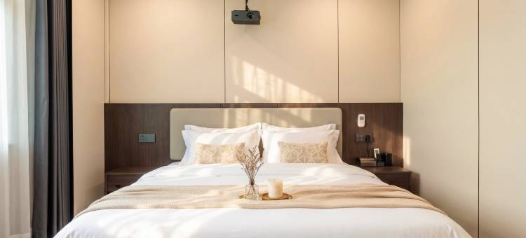 希亚顿·智能影音Leisure Time舒眠酒店(石城客运站宝福院塔店)图片