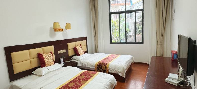 勐腊县勐仑春林宾馆图片