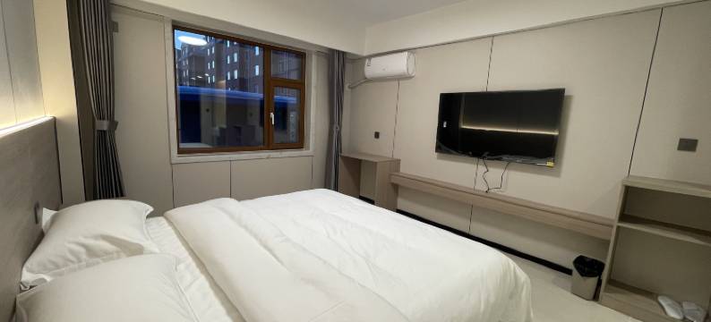 东丰柒朵宾馆(中医院店)图片