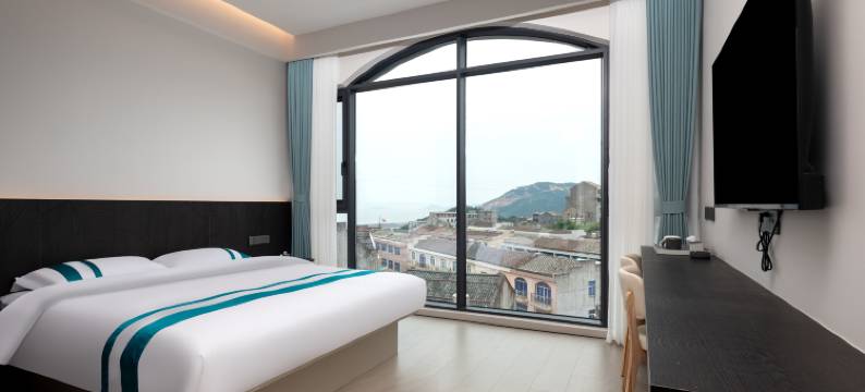 朝山暮海·暖心观海小筑(石塘半岛旅游度假区店)图片