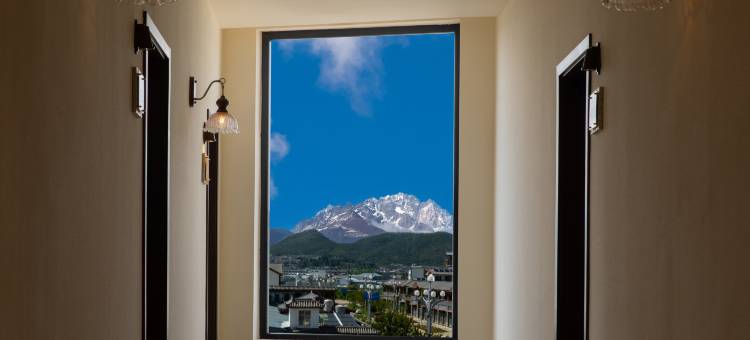既见山野丨日照金山空中花园雪山观景隐奢度假酒店(丽江古城店)图片