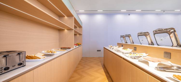 青岛新东程酒店(台东步行街万象城店)图片