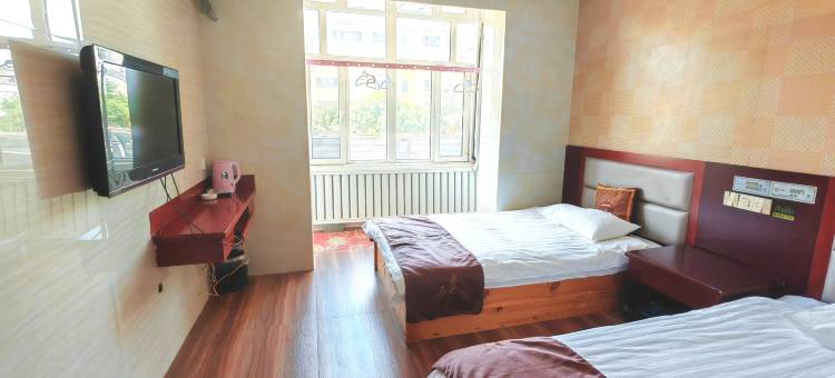 Q加·霍尔果斯六十二团雅富达商务酒店图片