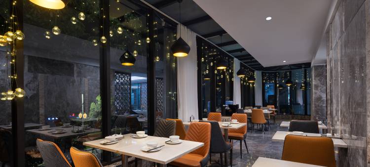 江门花沐禧酒店(新会冈中大道世纪广场店)图片