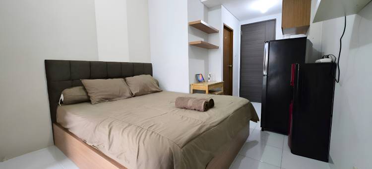 Apartemen amazana cheapest,cozy with wifi,pool and gym by luckystay图片