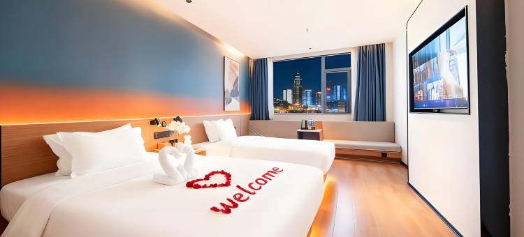 Xhotel青绵智慧酒店(进贤高铁站天虹商场店)图片