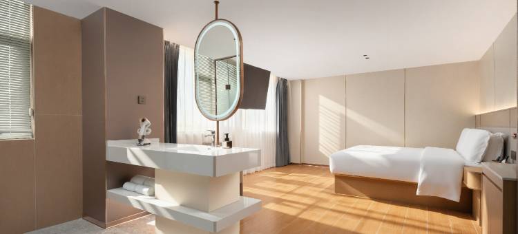 初渐酒店(文昌高铁站文南老街店)图片