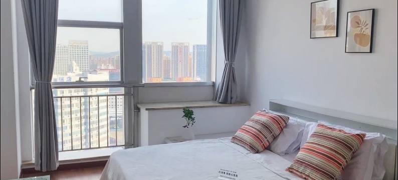 宏斌自助公寓(威海高铁站店)图片