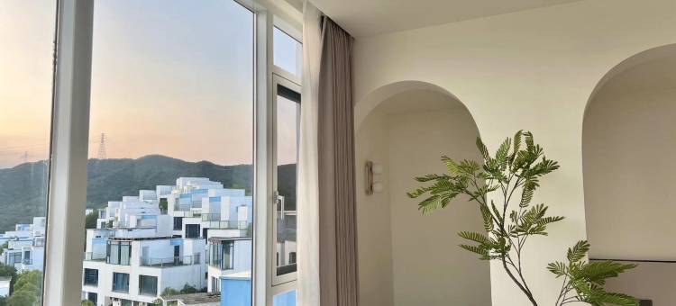 爱琴海缦山76号民宿(蓝白小镇店)图片