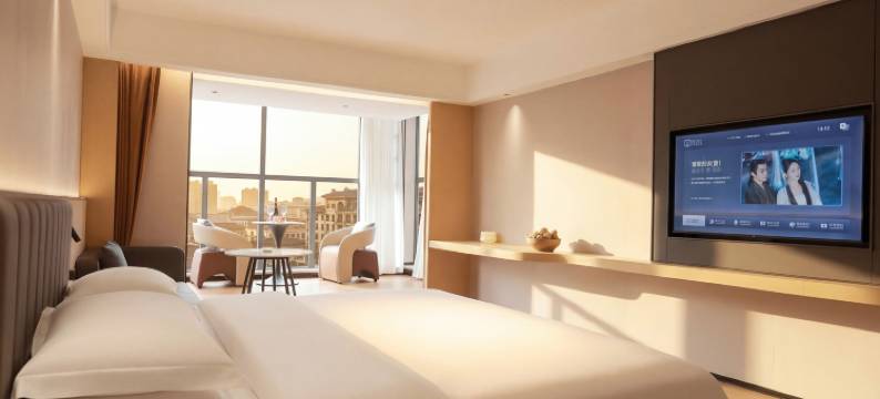 大浪淘沙酒店(盘州东湖公园合力广场店)图片