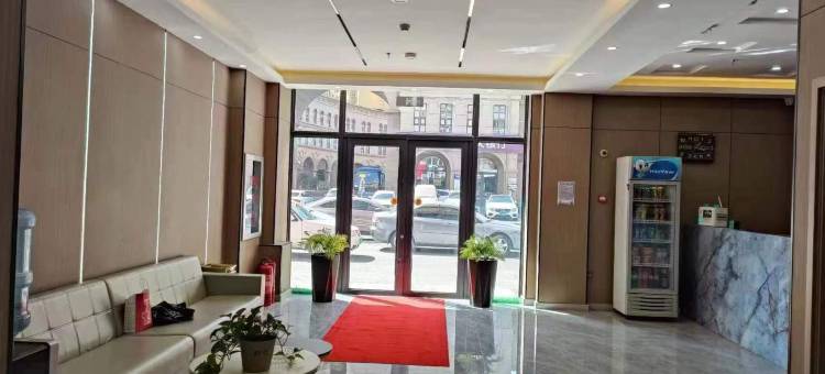 长春芒果宾馆(上海路万达广场活力城店)图片