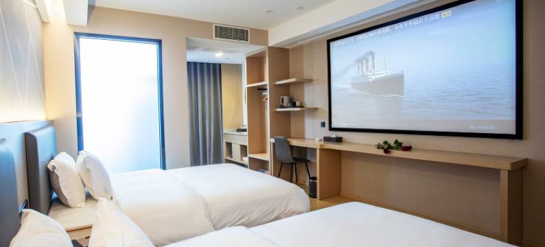 馨悦假日酒店(陆良图腾商业中心春光路店)图片