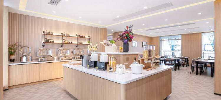 青岛鑫龙假日酒店(黄岛金沙滩钱塘江路青职学院地铁站店)图片