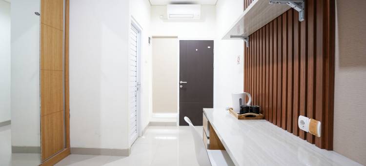 扎瓦尼沙里亚 Rajawali RedPartner Pakuwon购物中心青年旅馆(Dzawani Syariah Rajawali Near Pakuwon Mall RedPartner)图片