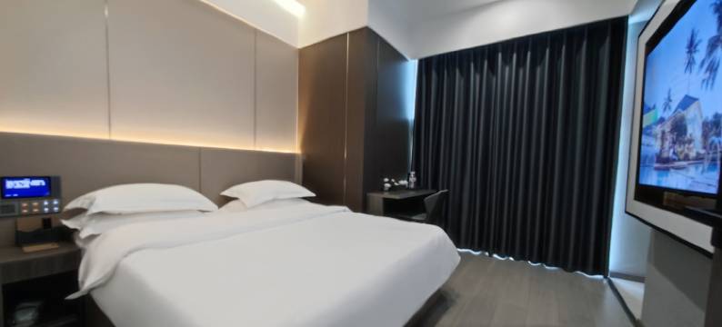 KM酒店(绥阳林达美食街店)图片