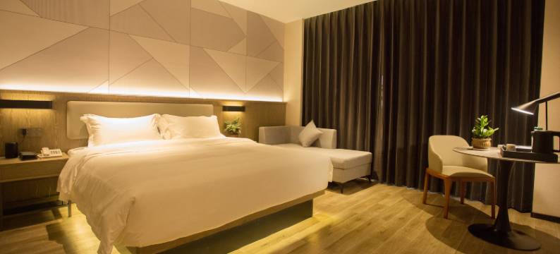 柏曼酒店(南丹洞天酒海店)图片