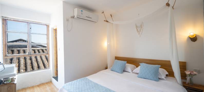 涠洲岛繁花.鲸落民宿(天主教堂贝壳沙滩店)图片