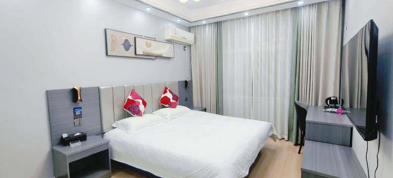 新郑月半弯宾馆(西亚斯学院店)图片