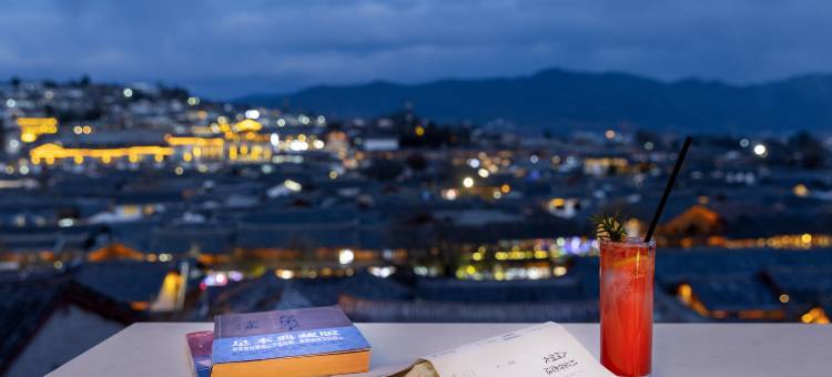 俏半山一城·设计师观古城雪山屋顶咖啡美宿(丽江古城大水车店)图片