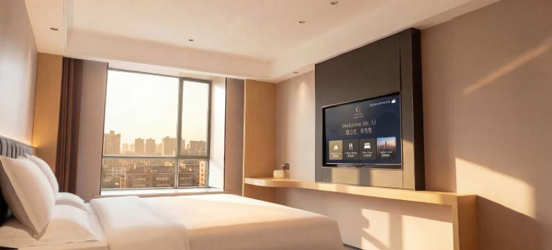 大浪淘沙酒店(盘州东湖公园合力广场店)图片