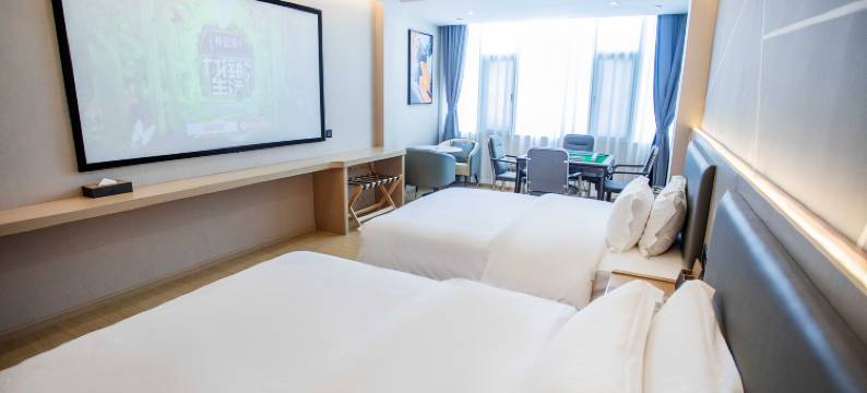 馨悦假日酒店(陆良图腾商业中心春光路店)图片