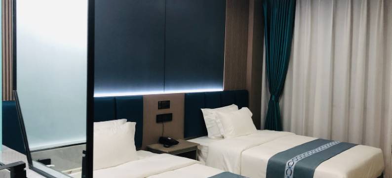 渝富豪酒店(海口五源河体育馆店)图片