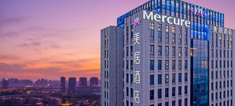 扬州东高铁站美居酒店(京杭大运河店)图片