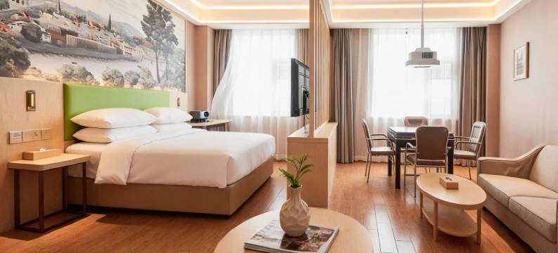 维｜也钠云境美居•静逸轻居•设计城市酒店(淮滨人民政府淮滨站店)图片