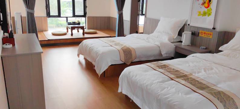 特克斯落凰阁民宿(八卦城店)图片