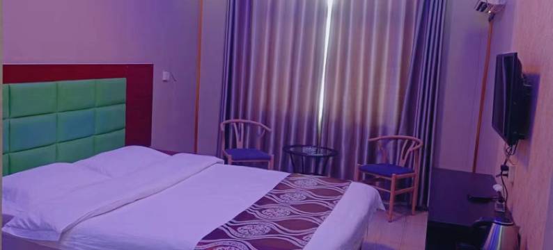 新郑阳光商务宾馆(高坡岩郑州经贸学院店)图片