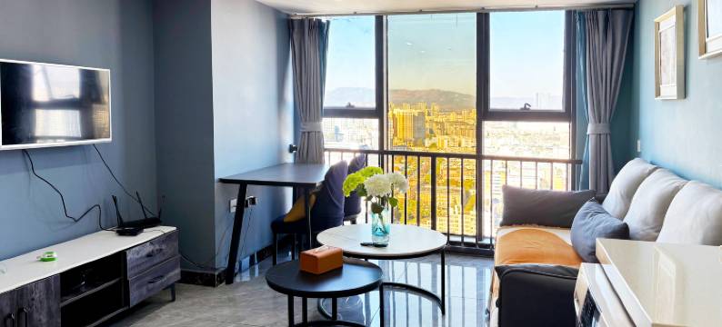 以礼娜姑民宿(云南财经大学龙泉校区万彩城店)图片