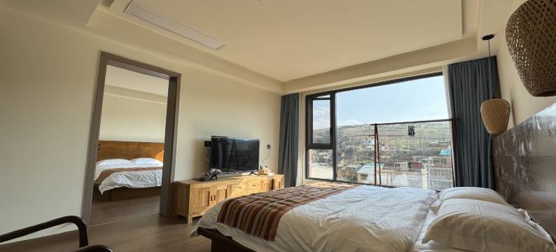 东巴部落民宿(昭通大山包景区店)图片