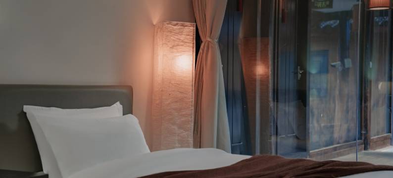 屿白归云艺术家民宿【束河古镇店】图片