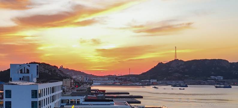 荣成凤栖海岸假日酒店(西霞口动物园店)图片