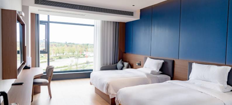 丽橙酒店(岳池火车站龙湖公园店)图片