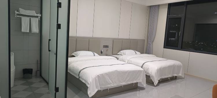 悦归宾馆(板仑店)图片