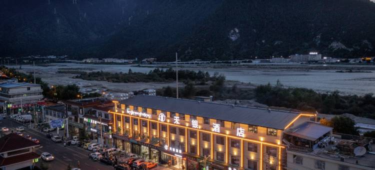 新天银酒店(客运中心店)图片