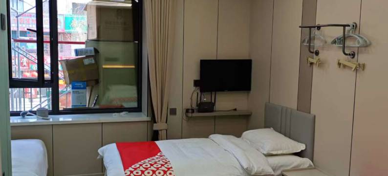 OYO鹤岗爱之旅宾馆图片