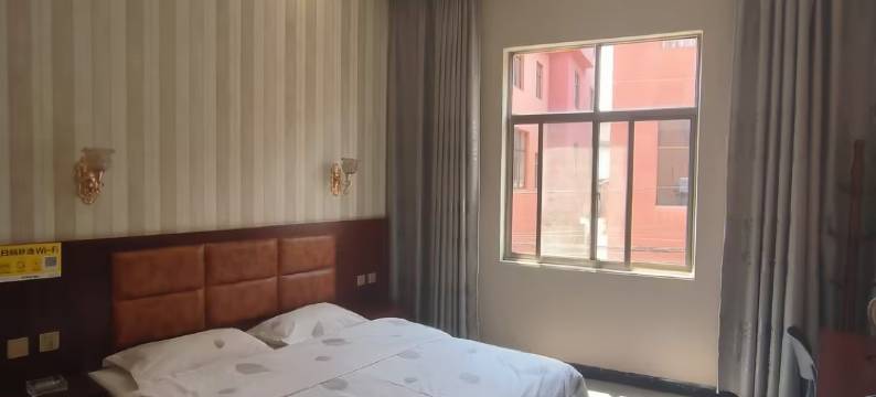 万佳宾馆(弥勒站店)图片