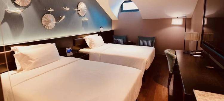 青岛崂山区石老人海水浴场桔子水晶酒店图片