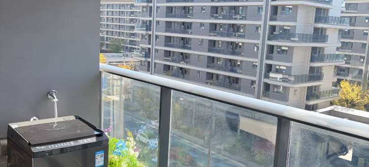 衢州屿霁服务公寓(衢州体育中心吾悦广场店)图片