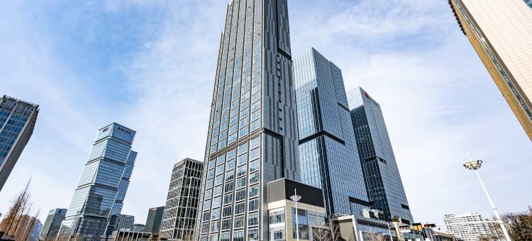 君逸海景酒店公寓(石老人国际会展中心店)图片